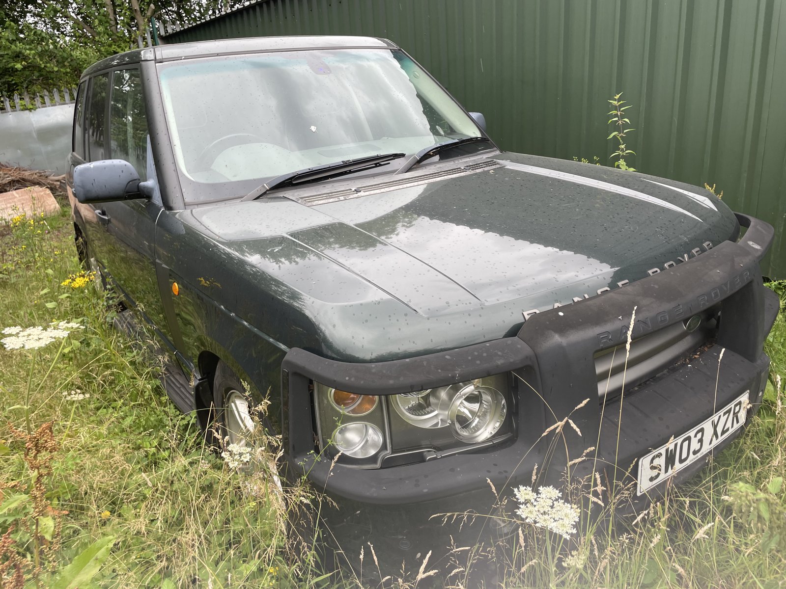 Green Range Rover scrap collection